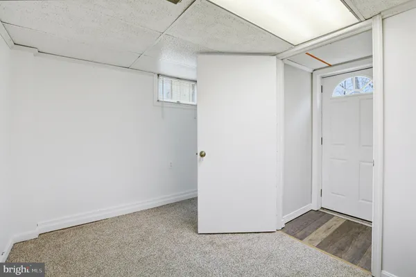 a refrigerator freezer sitting inside of a kitchen