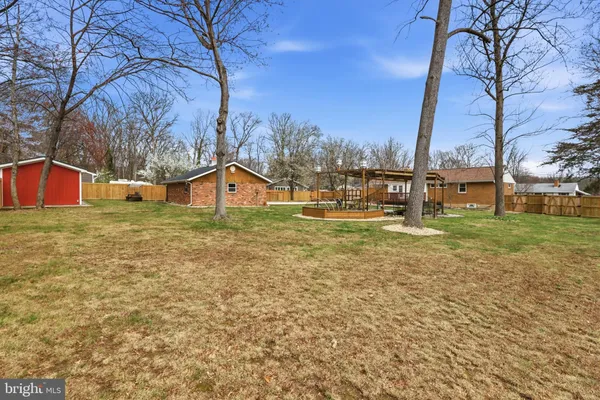 a view of a playground with basketball court