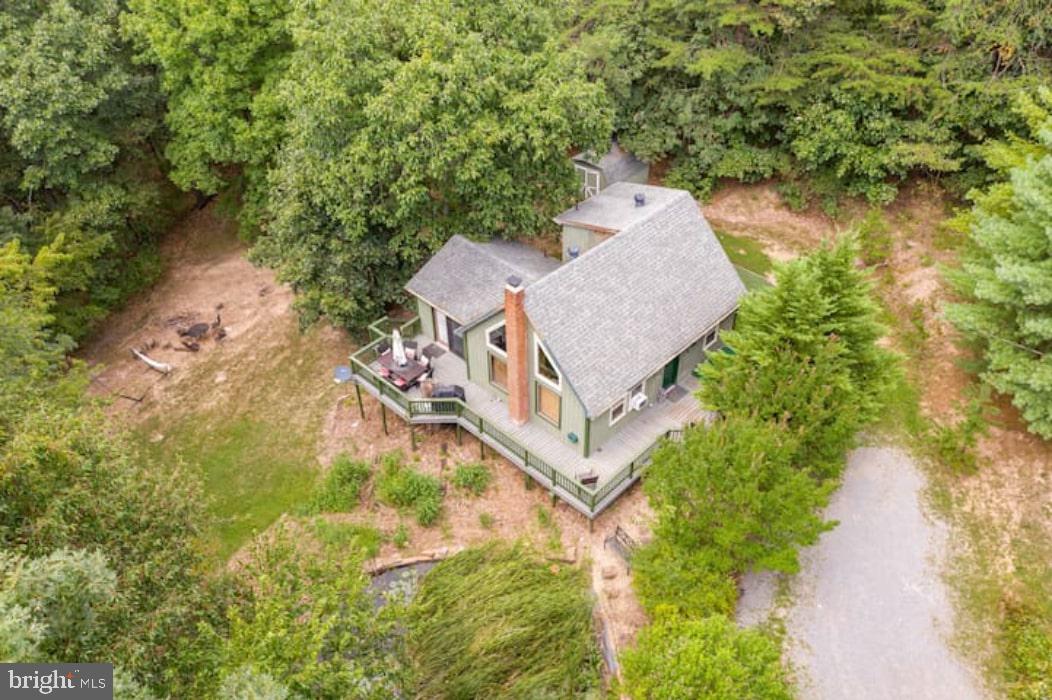3775 Pious Ridge Road Berkeley Springs, WV 25411 - Photo 2 of 45 Nestled in the trees