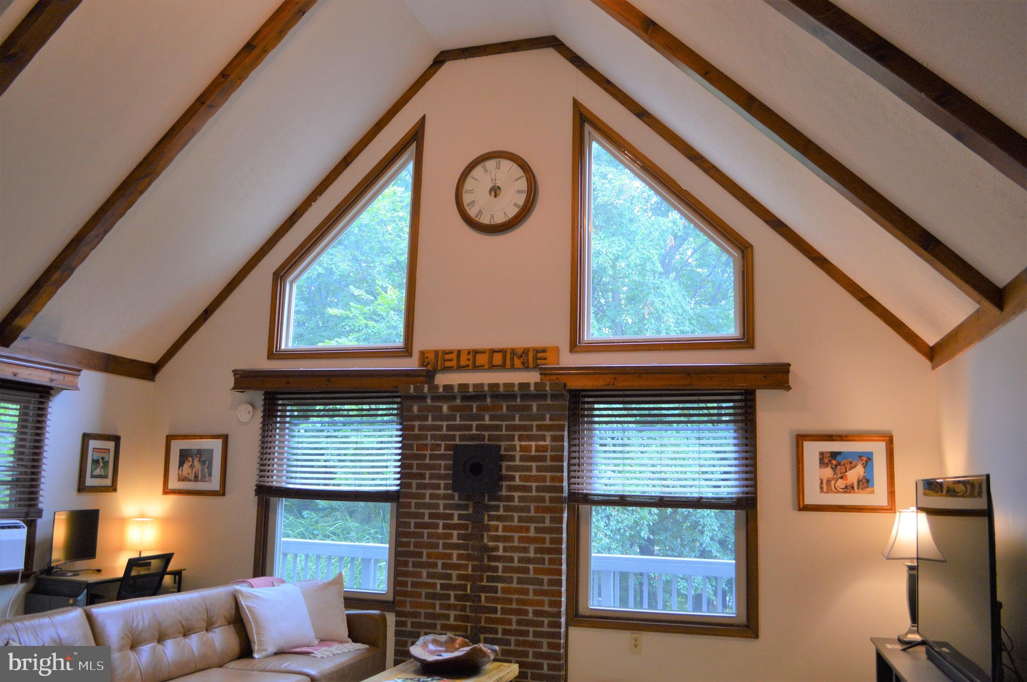 3775 Pious Ridge Road Berkeley Springs, WV 25411 - Photo 21 of 45 Wall of windows facing south