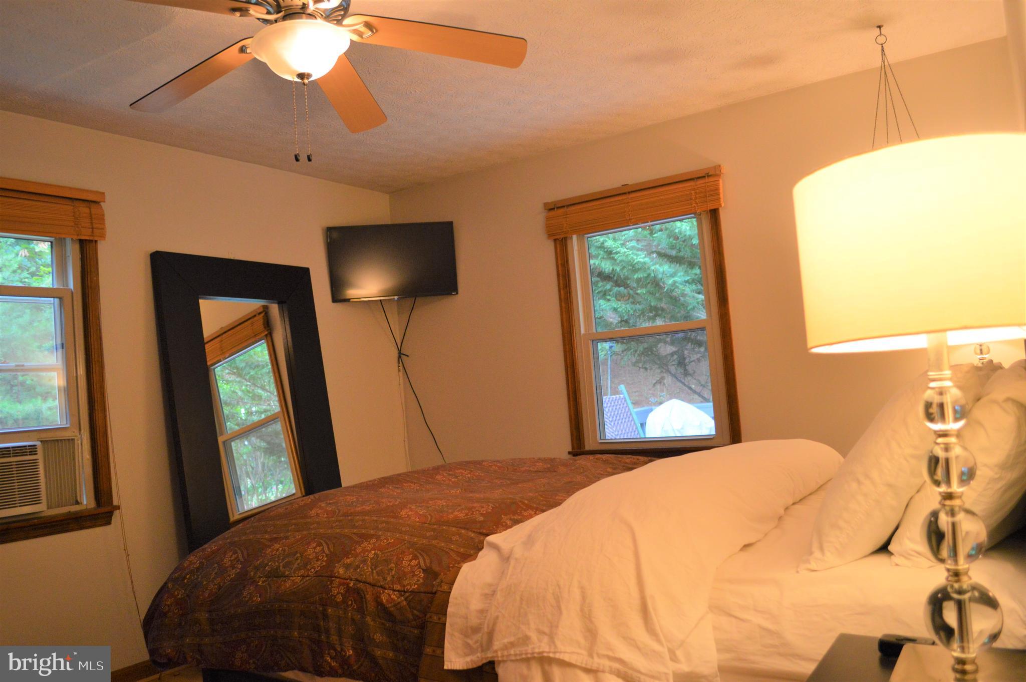 3775 Pious Ridge Road Berkeley Springs, WV 25411 - Photo 23 of 45 Main level bedroom