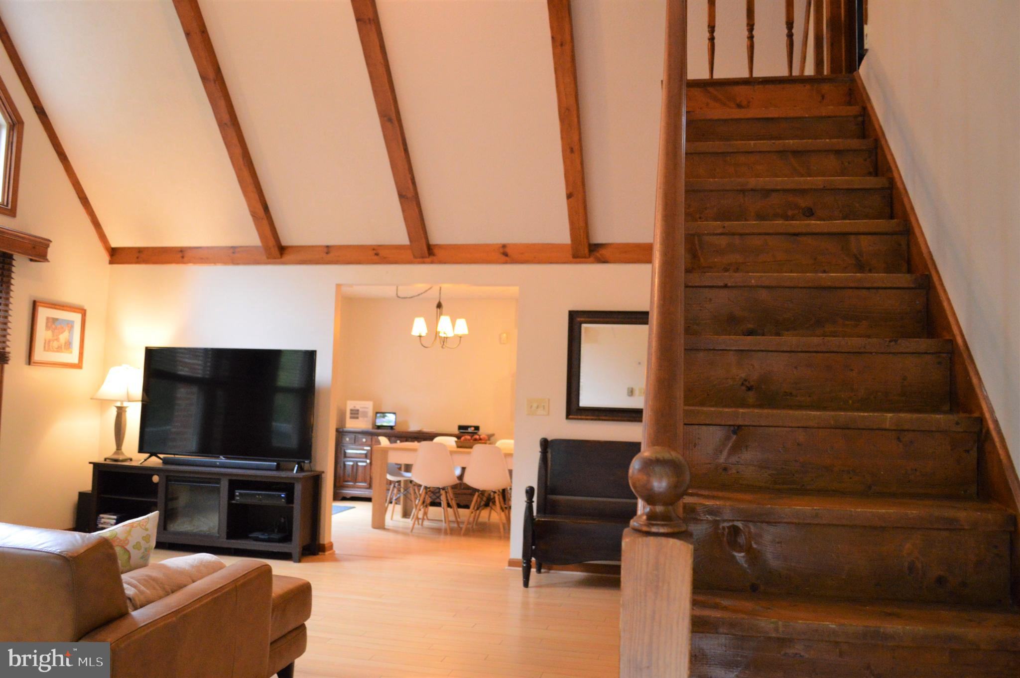 3775 Pious Ridge Road Berkeley Springs, WV 25411 - Photo 6 of 45 Cathedral Ceiling Living Room