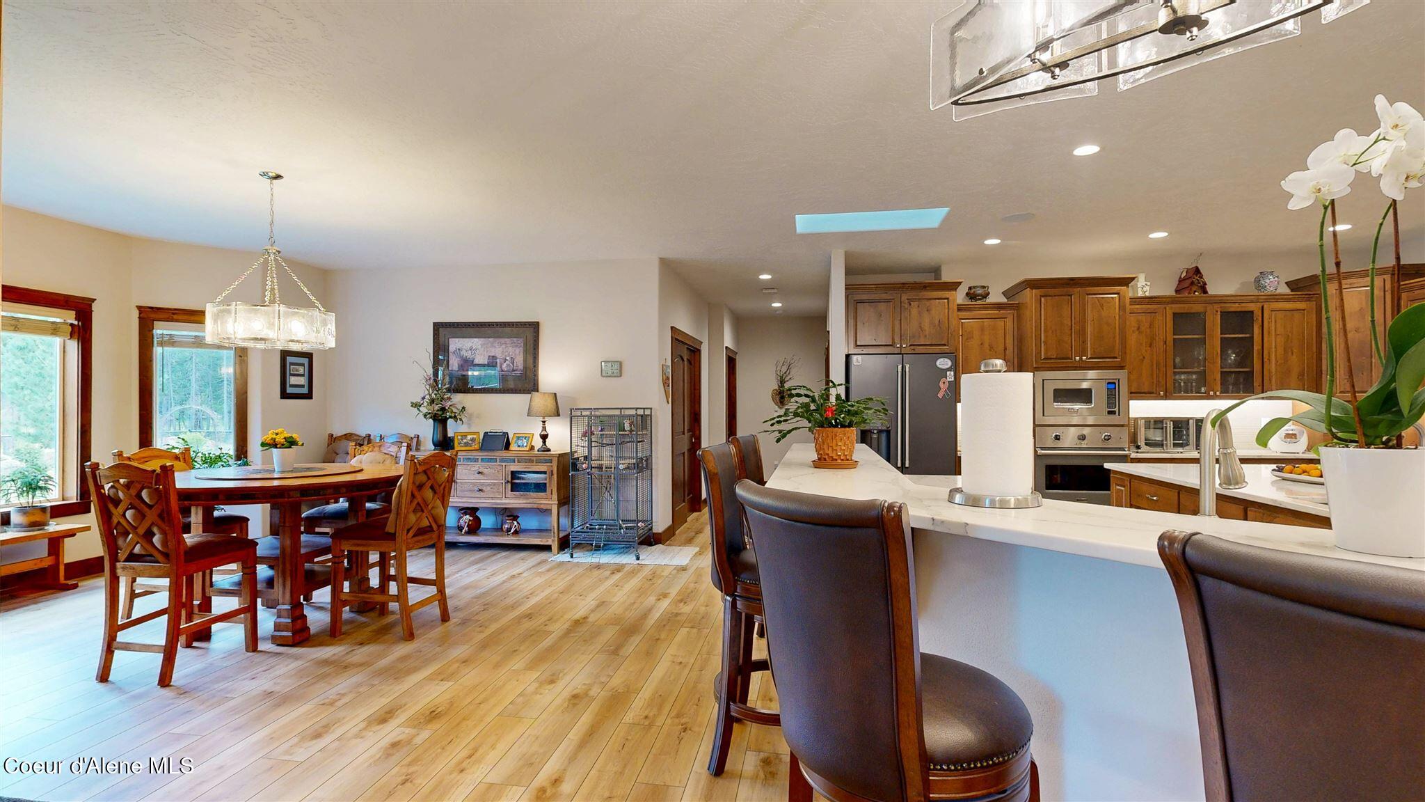 19398 North Ella Road Rathdrum, ID 83858 - Photo 22 of 88 view of nook & kitchen from living room