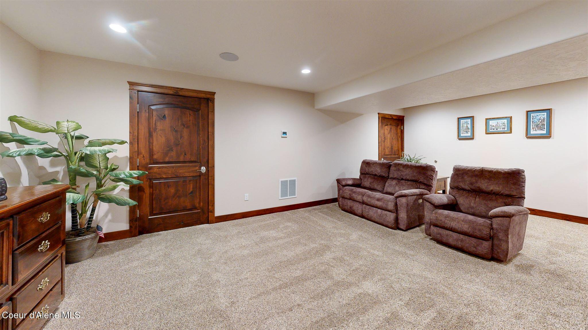 19398 North Ella Road Rathdrum, ID 83858 - Photo 46 of 88 basement family room1