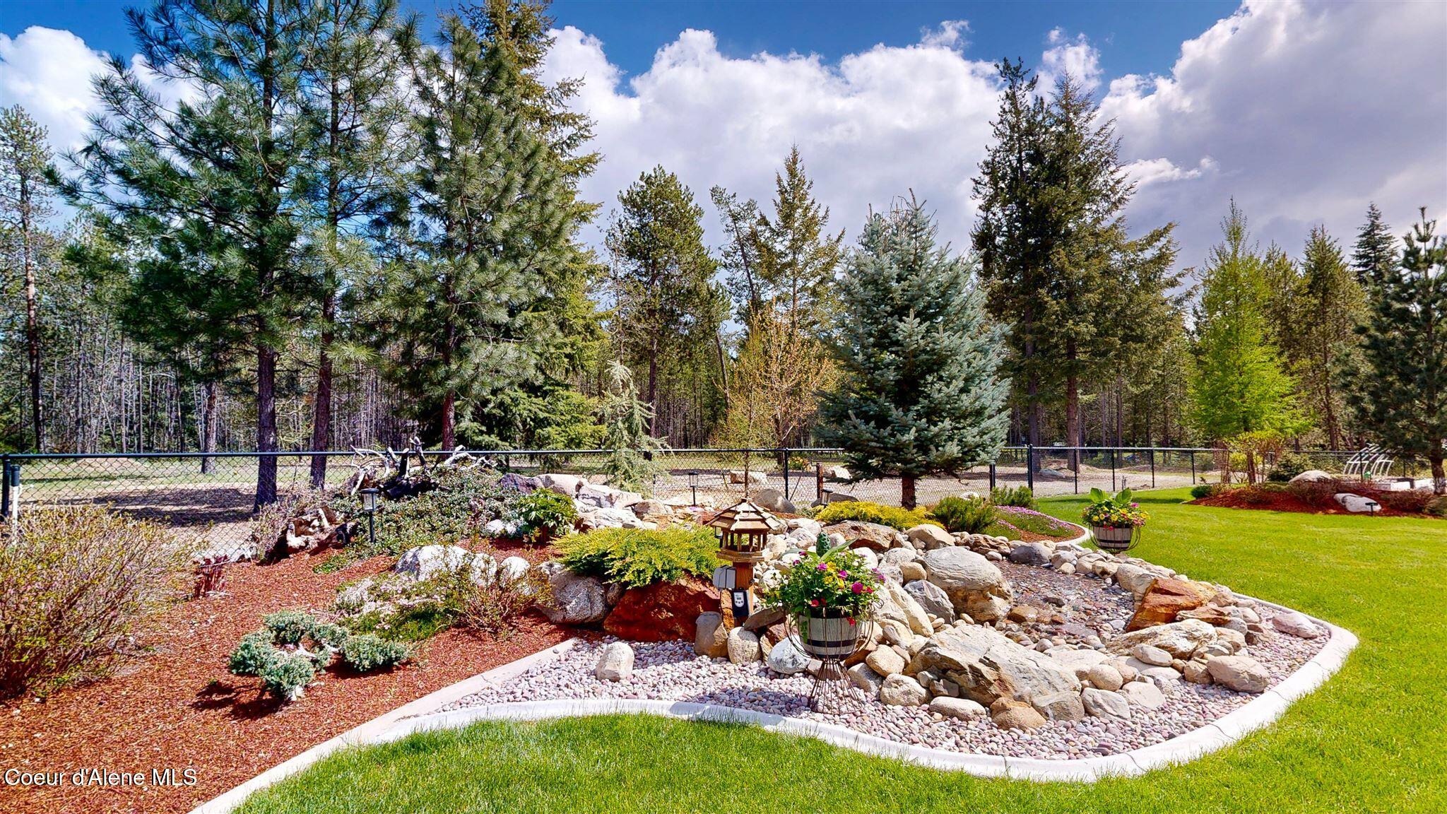 19398 North Ella Road Rathdrum, ID 83858 - Photo 66 of 88 backyard landscape with water feature