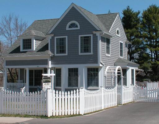 202 High Ridge Avenue Ridgefield, CT 06877 - Photo 1 of 1 a front view of a house with a porch