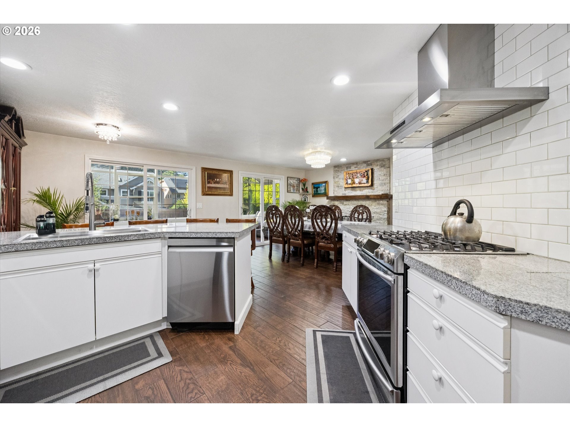 345 Southwest 207th Avenue Beaverton, OR 97006 - Photo 11 of 28 a kitchen with lots of counter top space and appliances