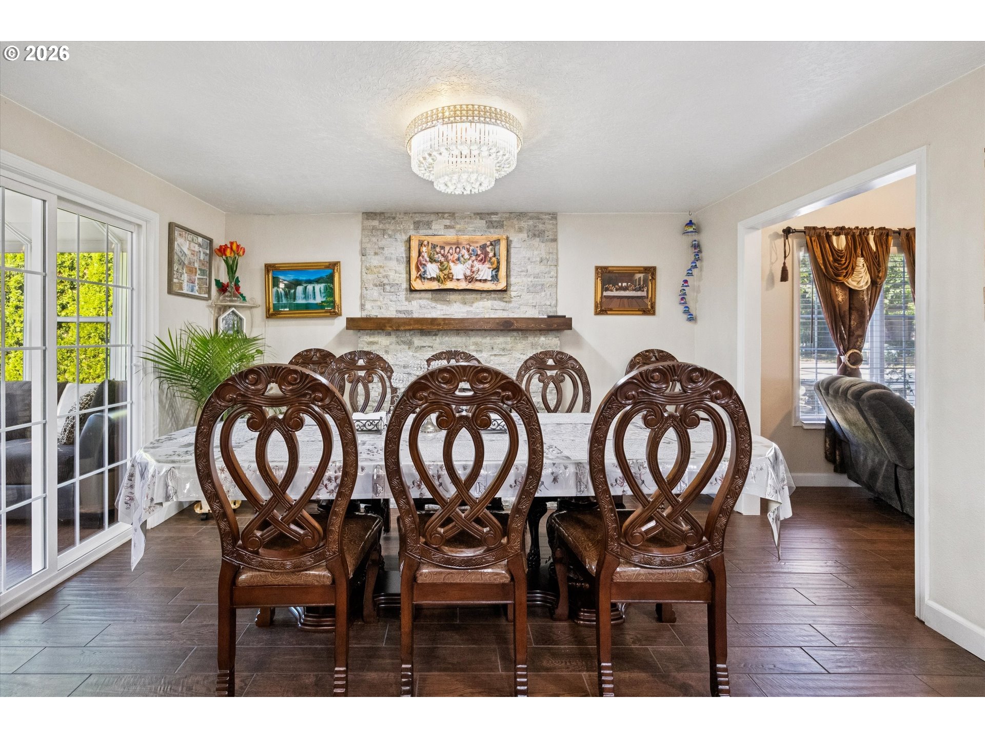 345 Southwest 207th Avenue Beaverton, OR 97006 - Photo 16 of 28 a view of a dining room with furniture window and wooden floor
