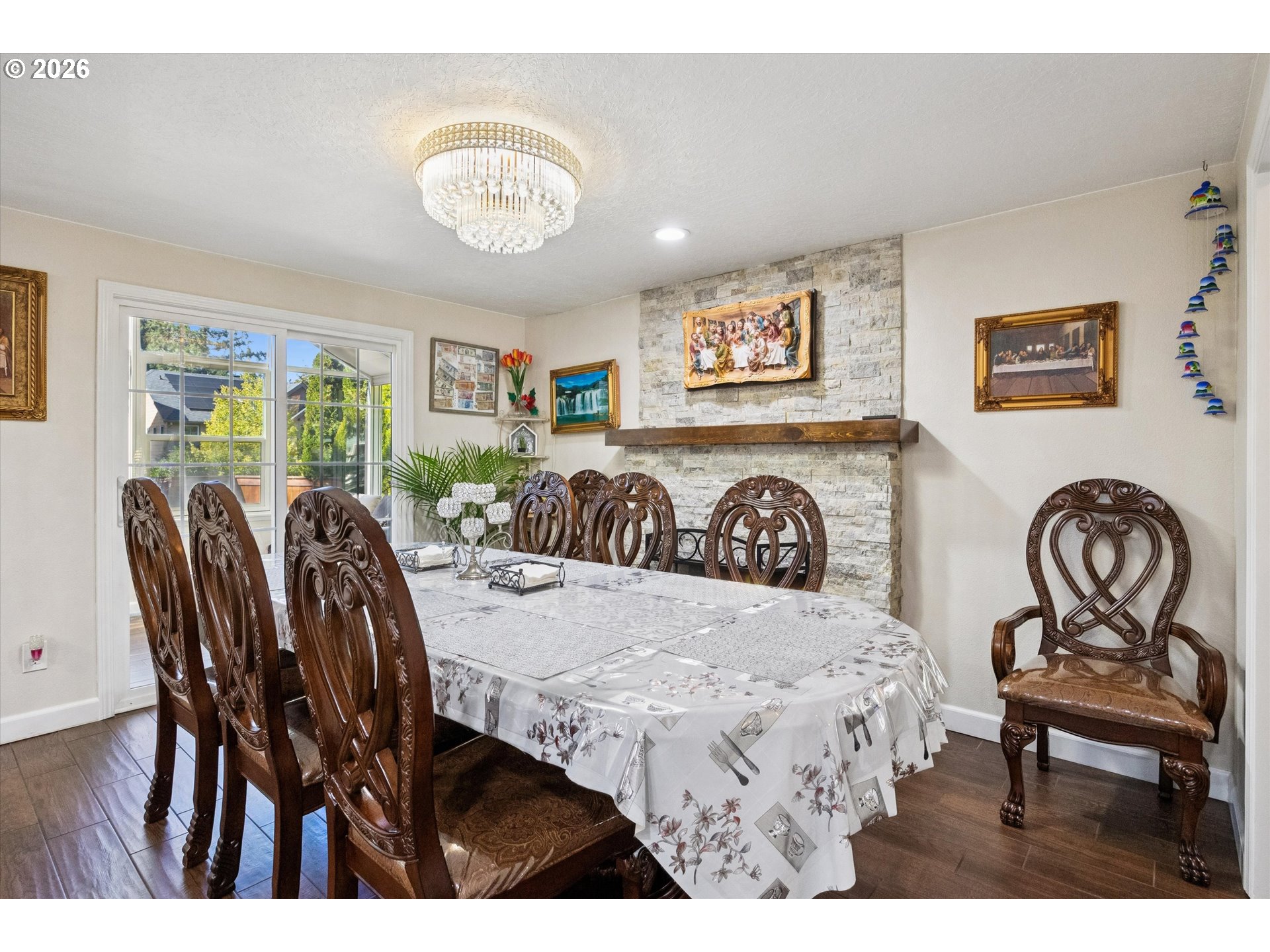 345 Southwest 207th Avenue Beaverton, OR 97006 - Photo 17 of 28 a view of a dining room with furniture and chandelier
