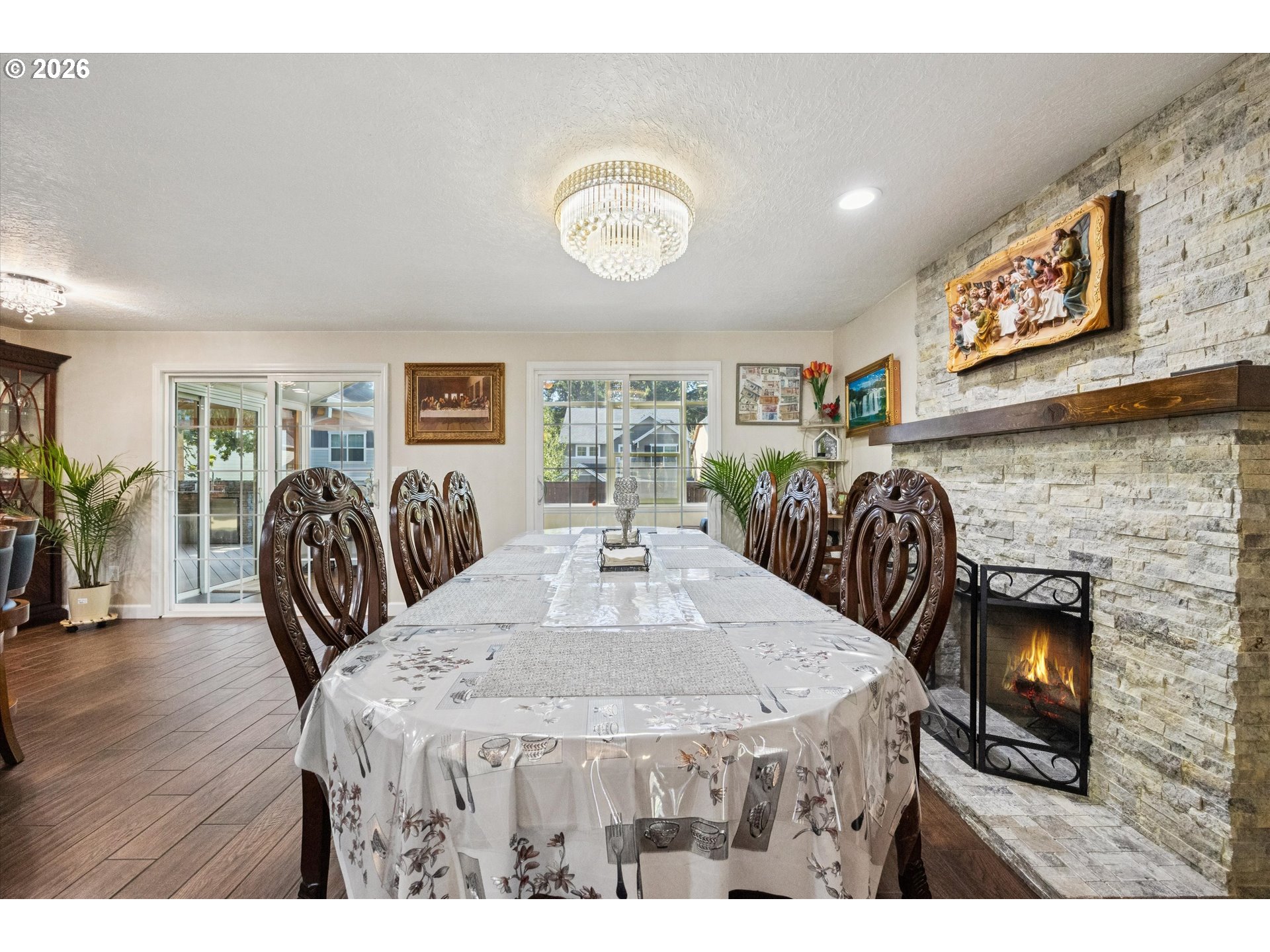345 Southwest 207th Avenue Beaverton, OR 97006 - Photo 18 of 28 a view of a dining room with furniture and wooden floor
