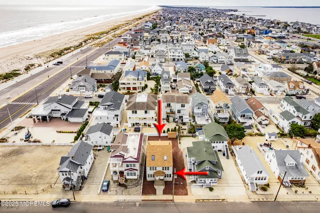 an aerial view of beach and ocean