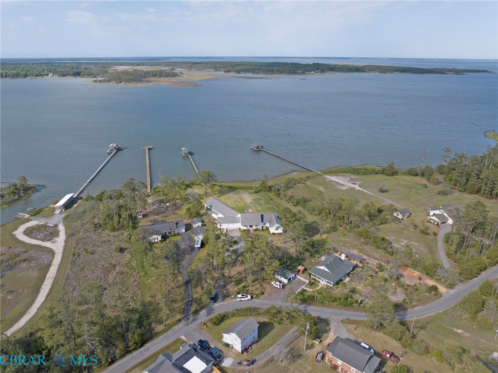 9093 Stump Point Road Hayes, VA 23072 - Photo 36 of 40 Waterfront property featuring multiple private docks extending into the bay