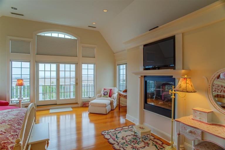 30 Williams Path West Barnstable, MA 02668 - Photo 20 of 35 a living room with fireplace furniture and a flat screen tv
