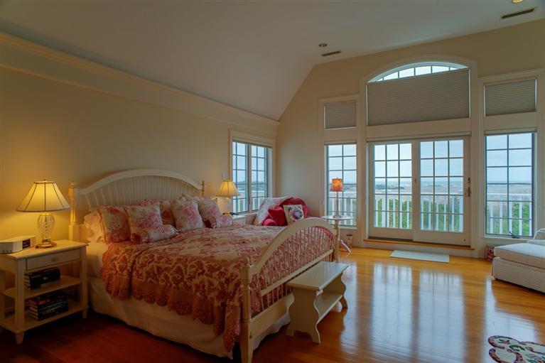30 Williams Path West Barnstable, MA 02668 - Photo 21 of 35 a bedroom with a bed and a large window