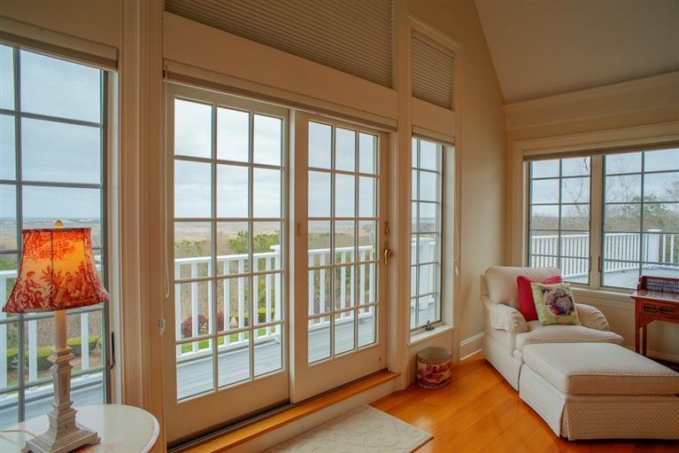 30 Williams Path West Barnstable, MA 02668 - Photo 23 of 35 a living room with furniture and a floor to ceiling window
