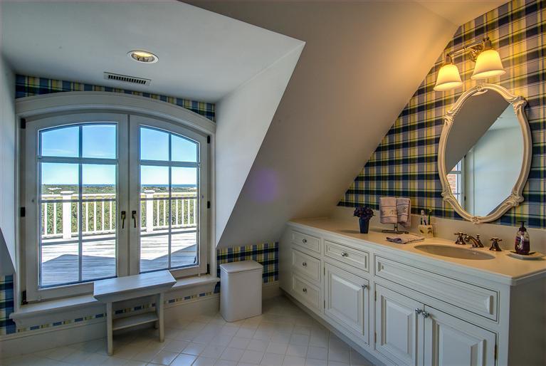 30 Williams Path West Barnstable, MA 02668 - Photo 25 of 35 a bathroom with a double vanity sink and a mirror