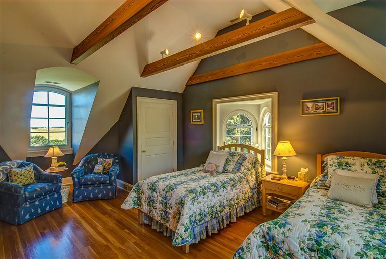 30 Williams Path West Barnstable, MA 02668 - Photo 26 of 35 a bedroom with a bed and wooden floor