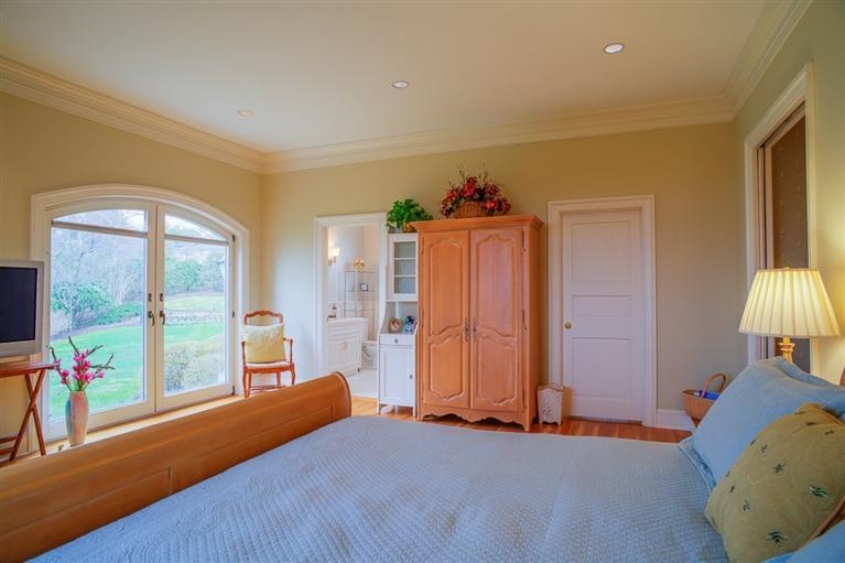 30 Williams Path West Barnstable, MA 02668 - Photo 28 of 35 a bed room with a bed and a large window