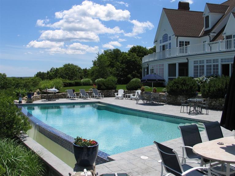 30 Williams Path West Barnstable, MA 02668 - Photo 6 of 35 a view of a lake with a house swimming pool and outdoor seating