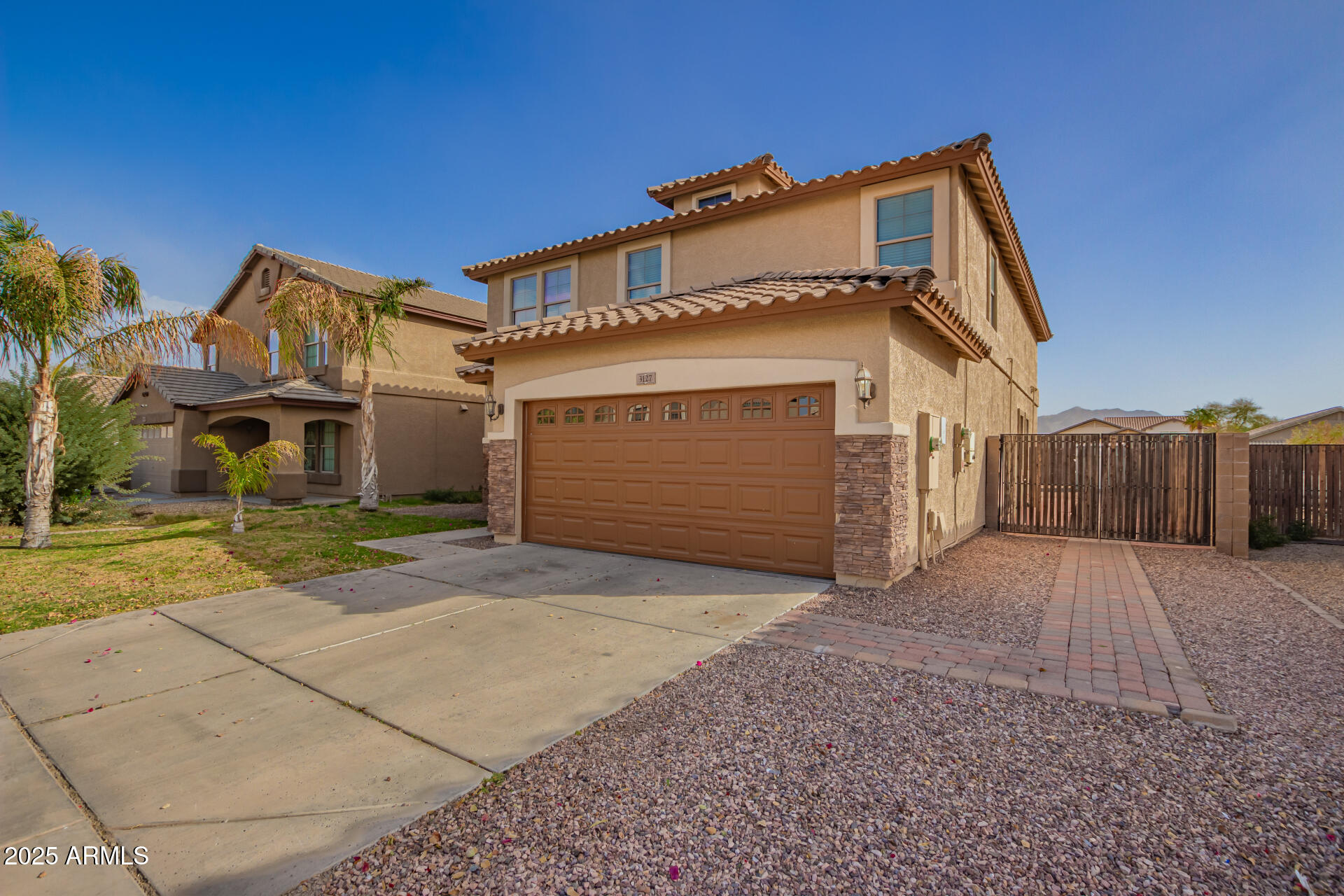 3127 West Apollo Road Phoenix, AZ 85041 - Photo 1 of 28 a view of a house with a yard