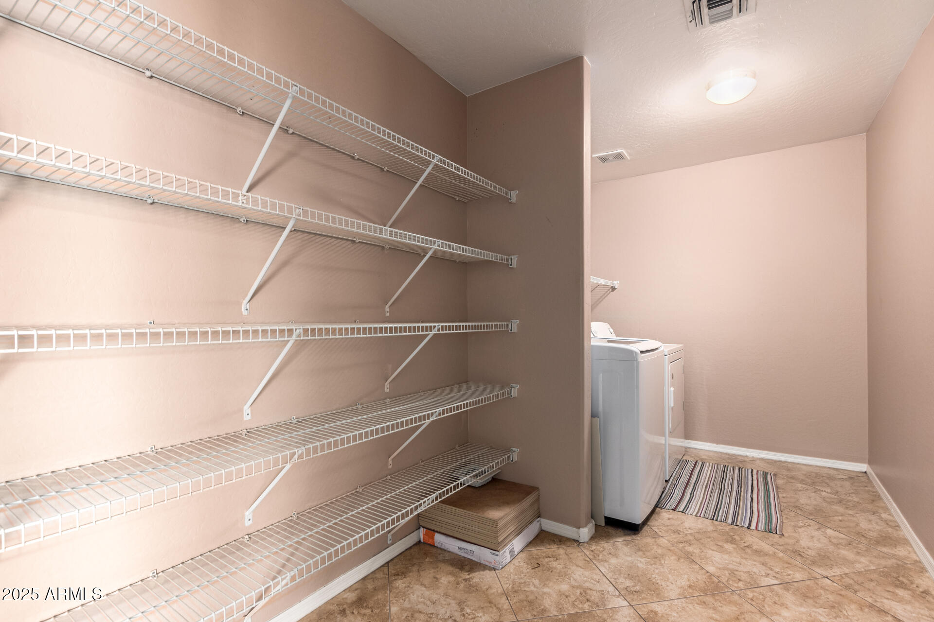 3127 West Apollo Road Phoenix, AZ 85041 - Photo 25 of 28 a view of a room with door