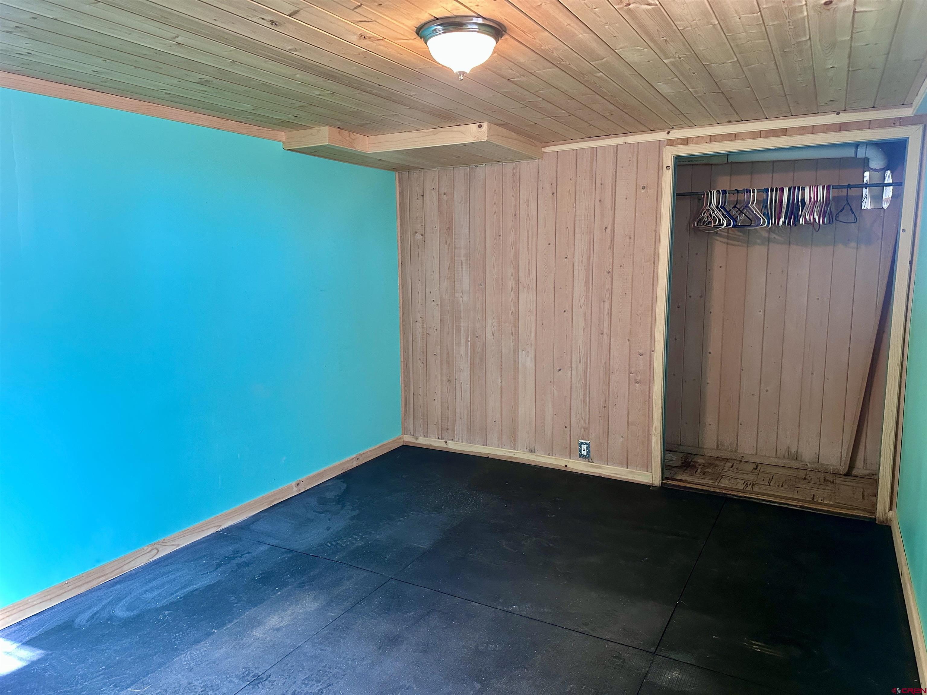 2559 County Road 329 Ignacio, CO 81137 - Photo 20 of 31 a view of an empty room and wooden floor