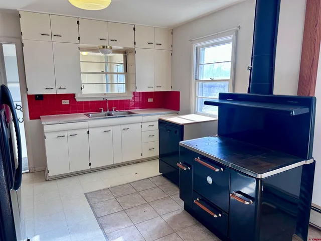 a room with cabinets and window