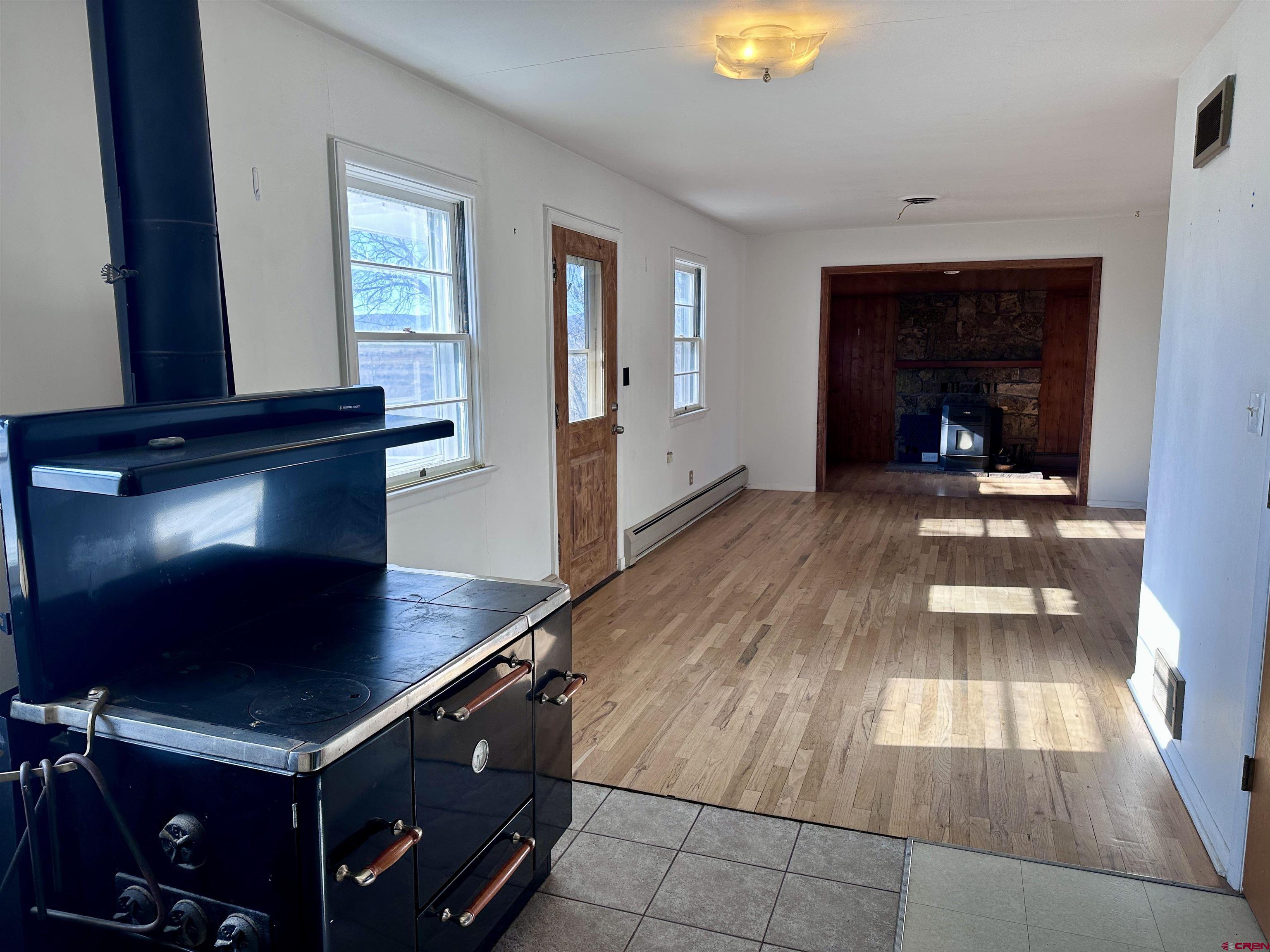 2559 County Road 329 Ignacio, CO 81137 - Photo 5 of 31 a living room with furniture and a fireplace