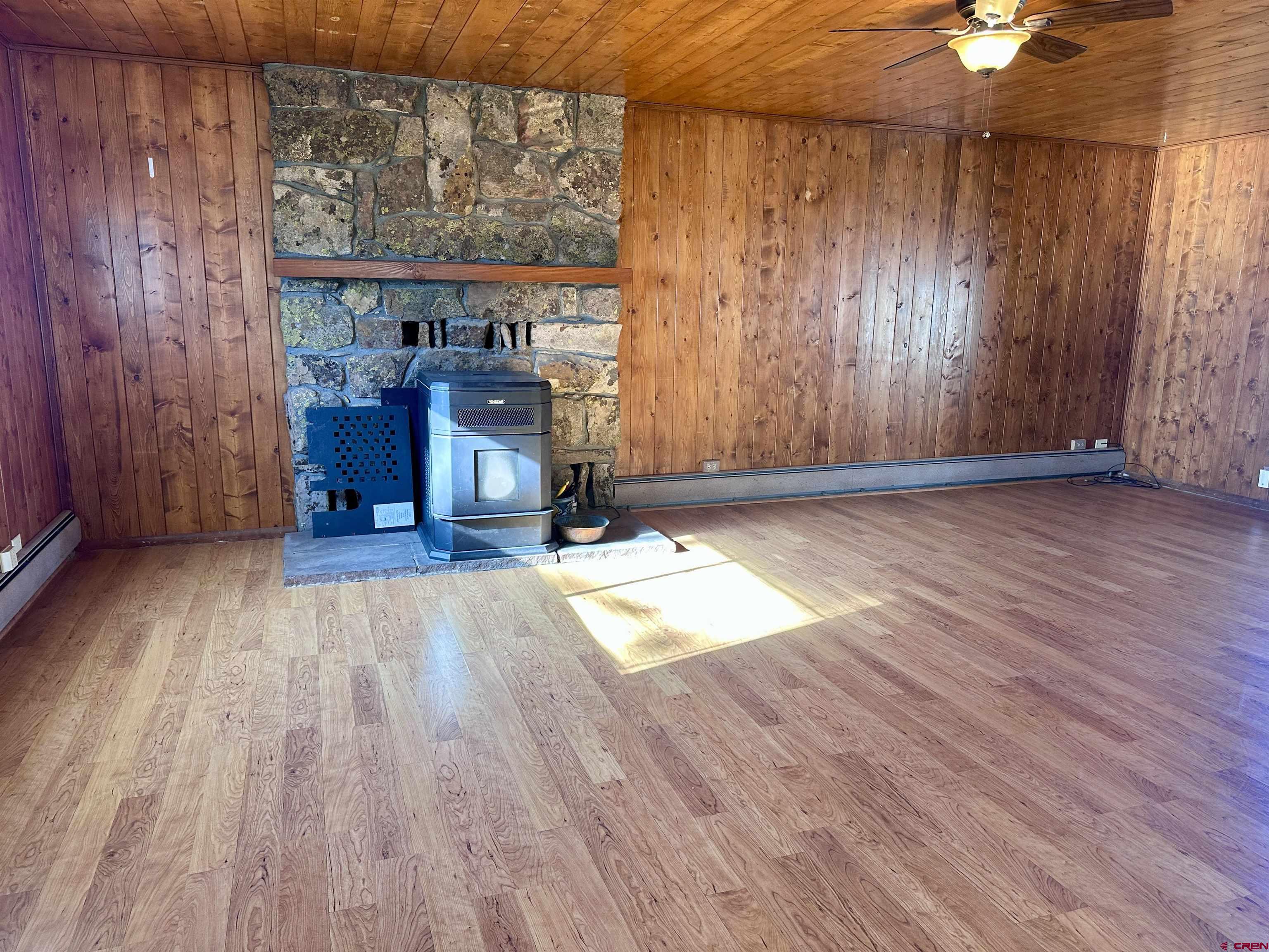2559 County Road 329 Ignacio, CO 81137 - Photo 7 of 31 a view of empty room with wooden floor and fan