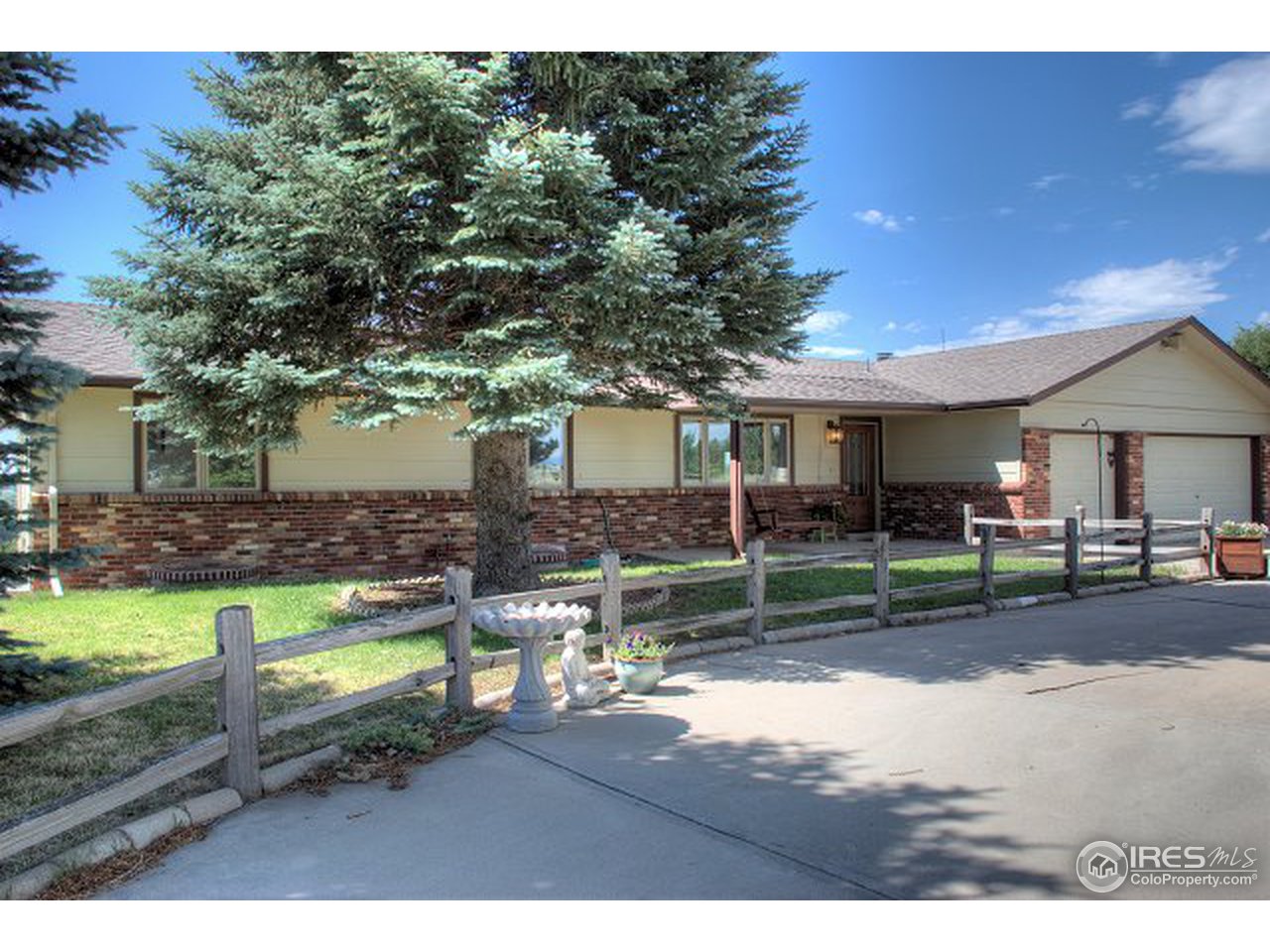 9920 Phillips Road Lafayette, CO 80026 - Photo 1 of 18 a view of house and outdoor space