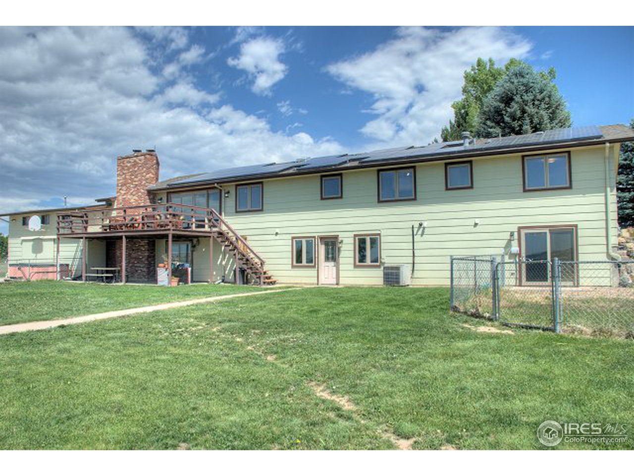 9920 Phillips Road Lafayette, CO 80026 - Photo 13 of 18 a front view of a house with a yard