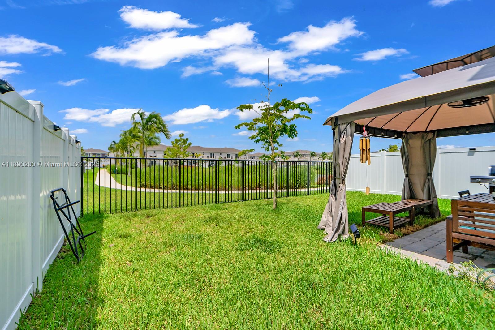 1772 Southeast 8th Street Homestead, FL 33033 - Photo 17 of 42 a view of a backyard