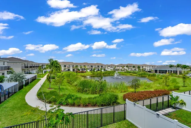 a view of a garden and lake