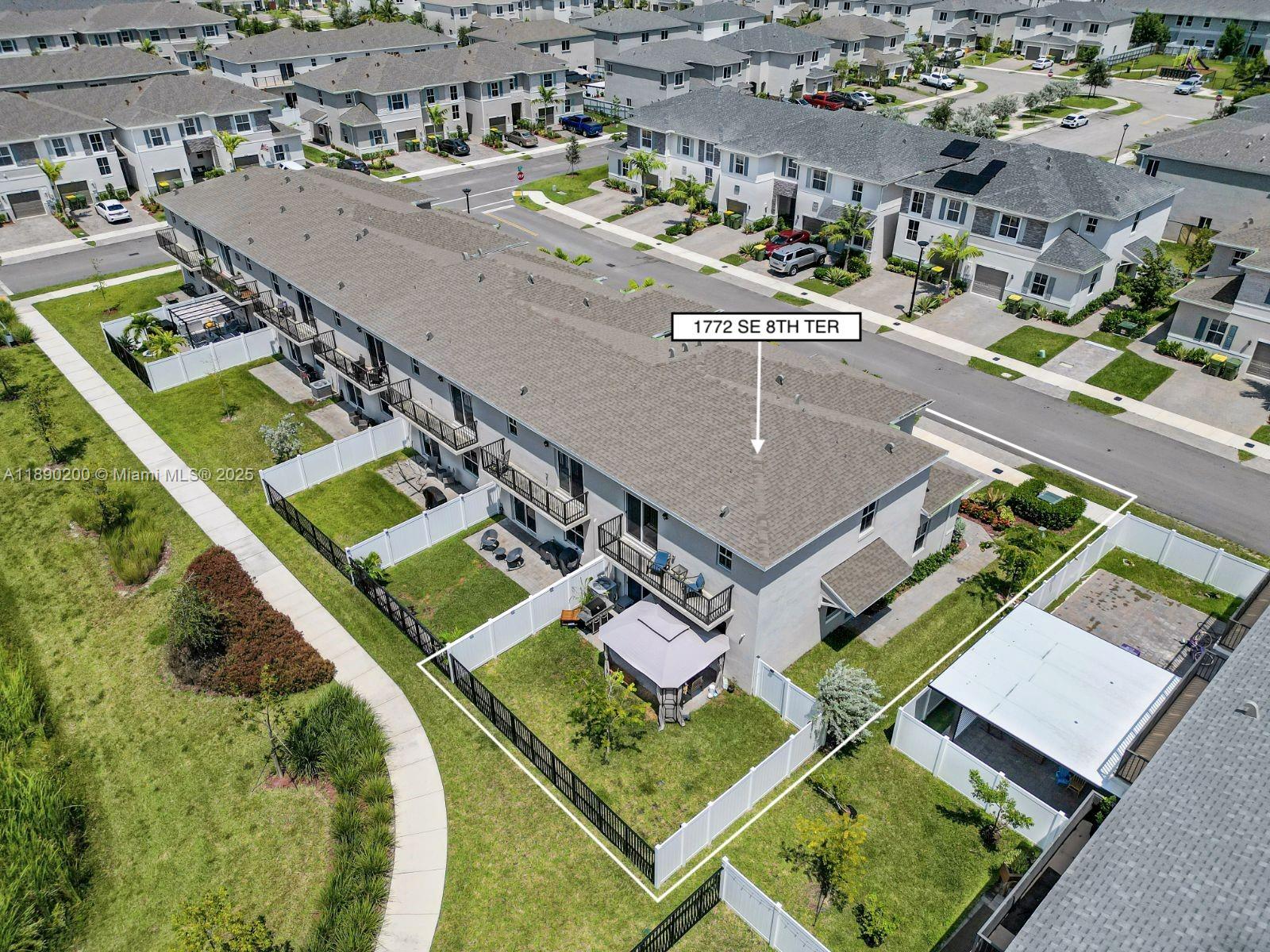 1772 Southeast 8th Street Homestead, FL 33033 - Photo 34 of 42 an aerial view of a house with a swimming pool