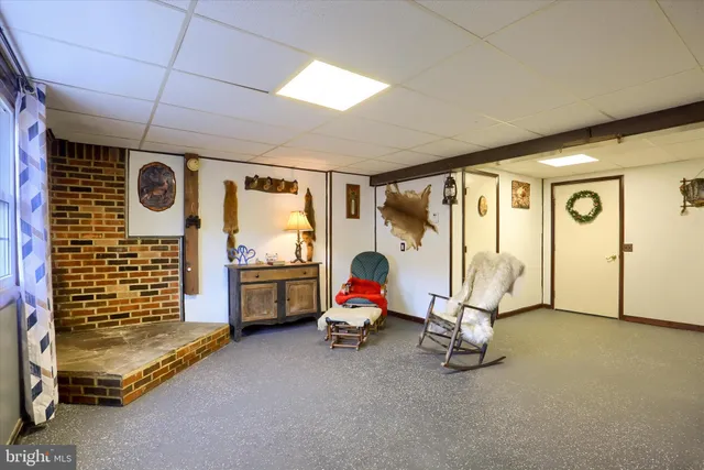 a room with gym equipment and a large window