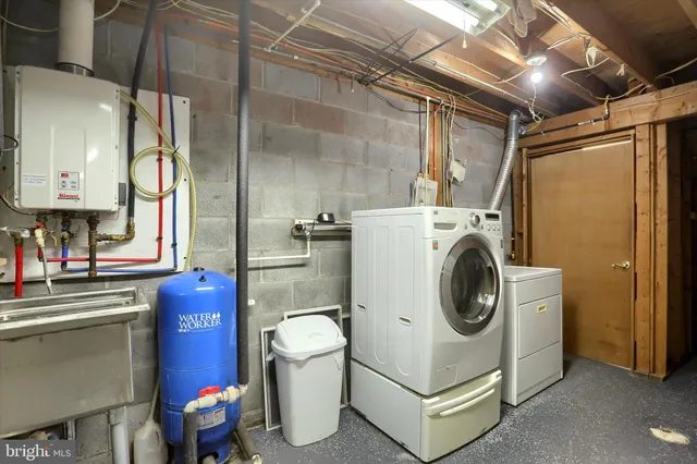 a utility room with dryer and washer