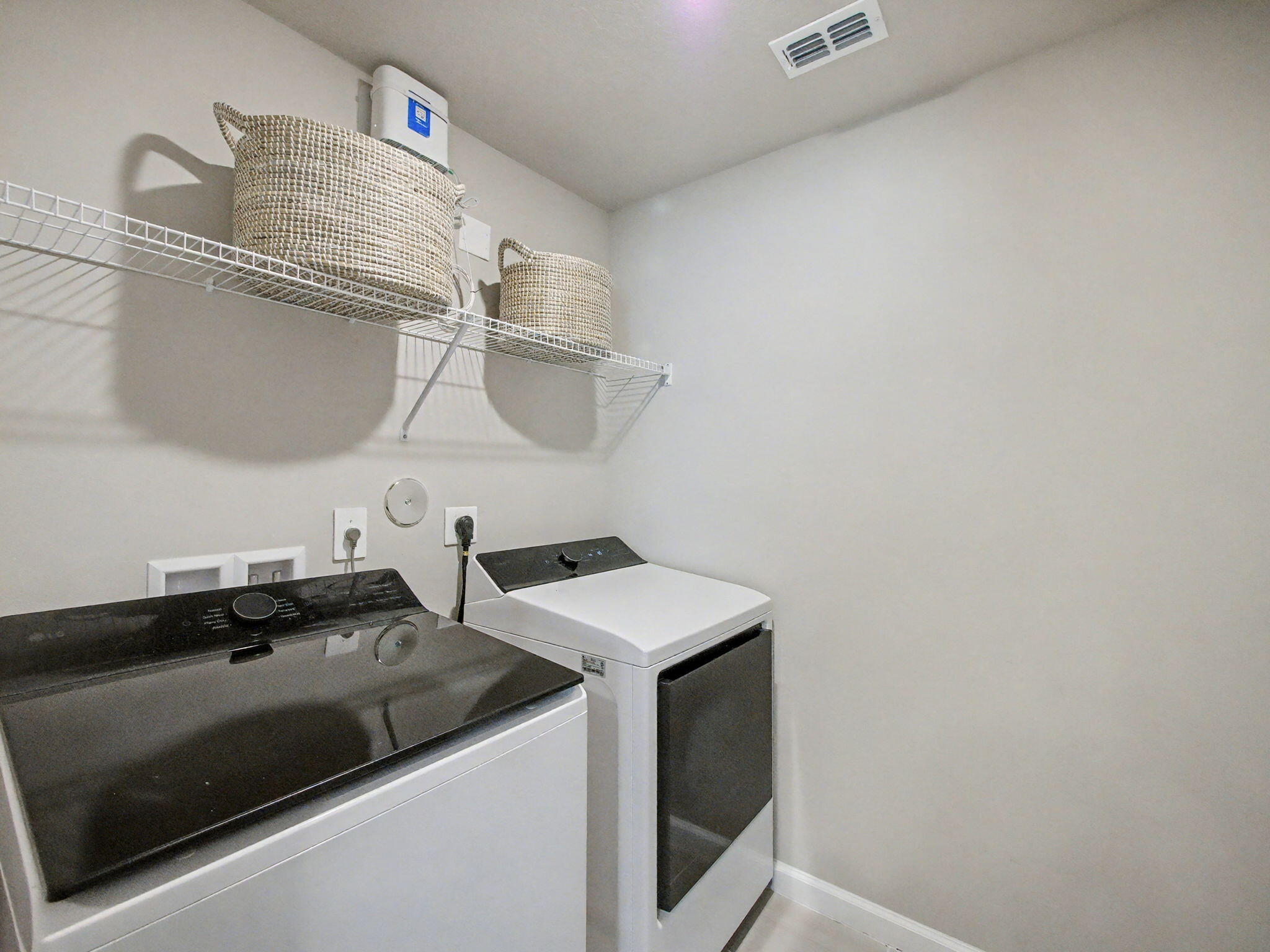 5747 Southeast Edgewater Circle Stuart, FL 34997 - Photo 37 of 45 Laundry Room