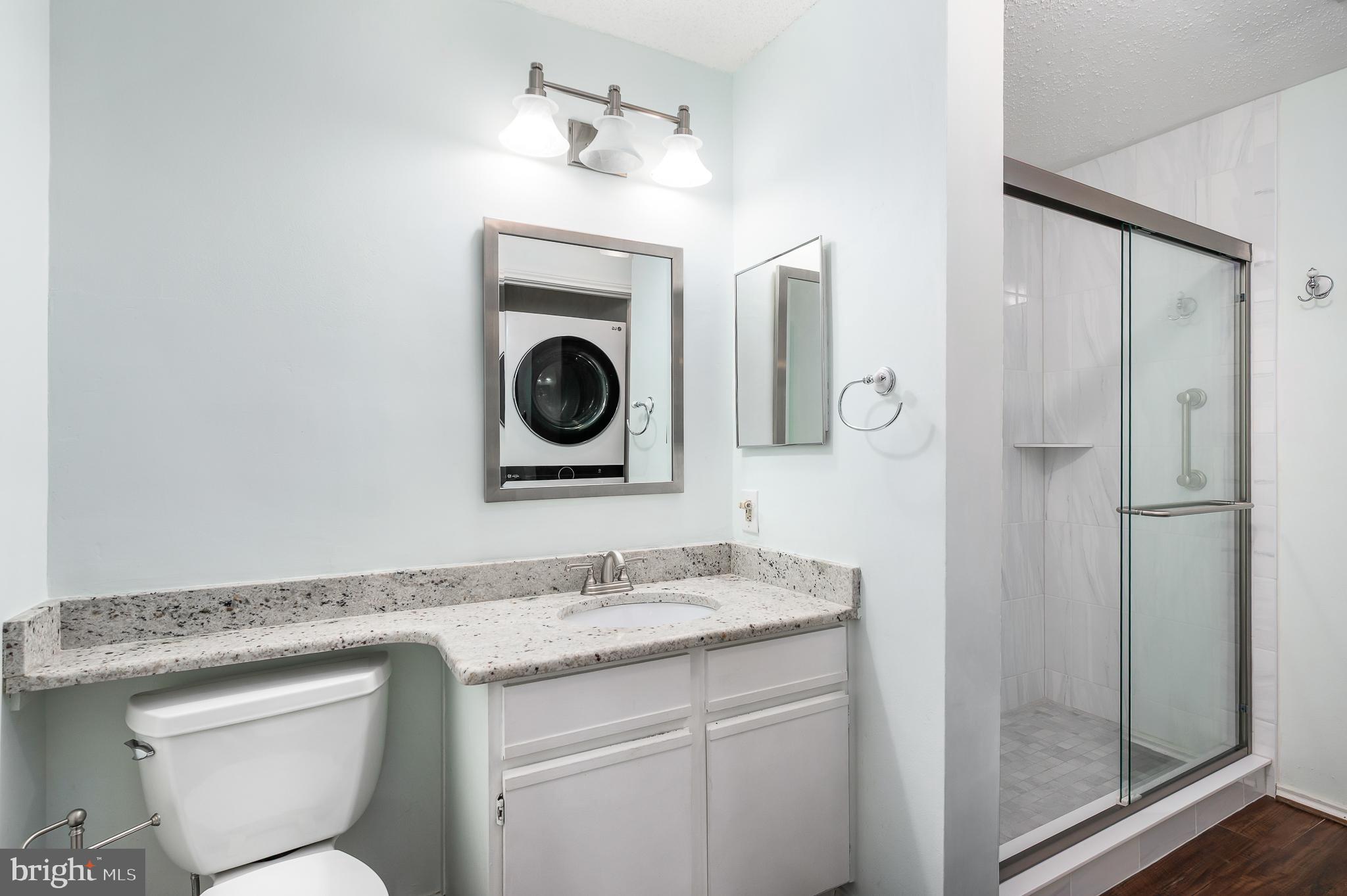 21029 Timber Ridge Terrace, Unit 104 Ashburn, VA 20147 - Photo 22 of 34 Updated Owner's bathroom