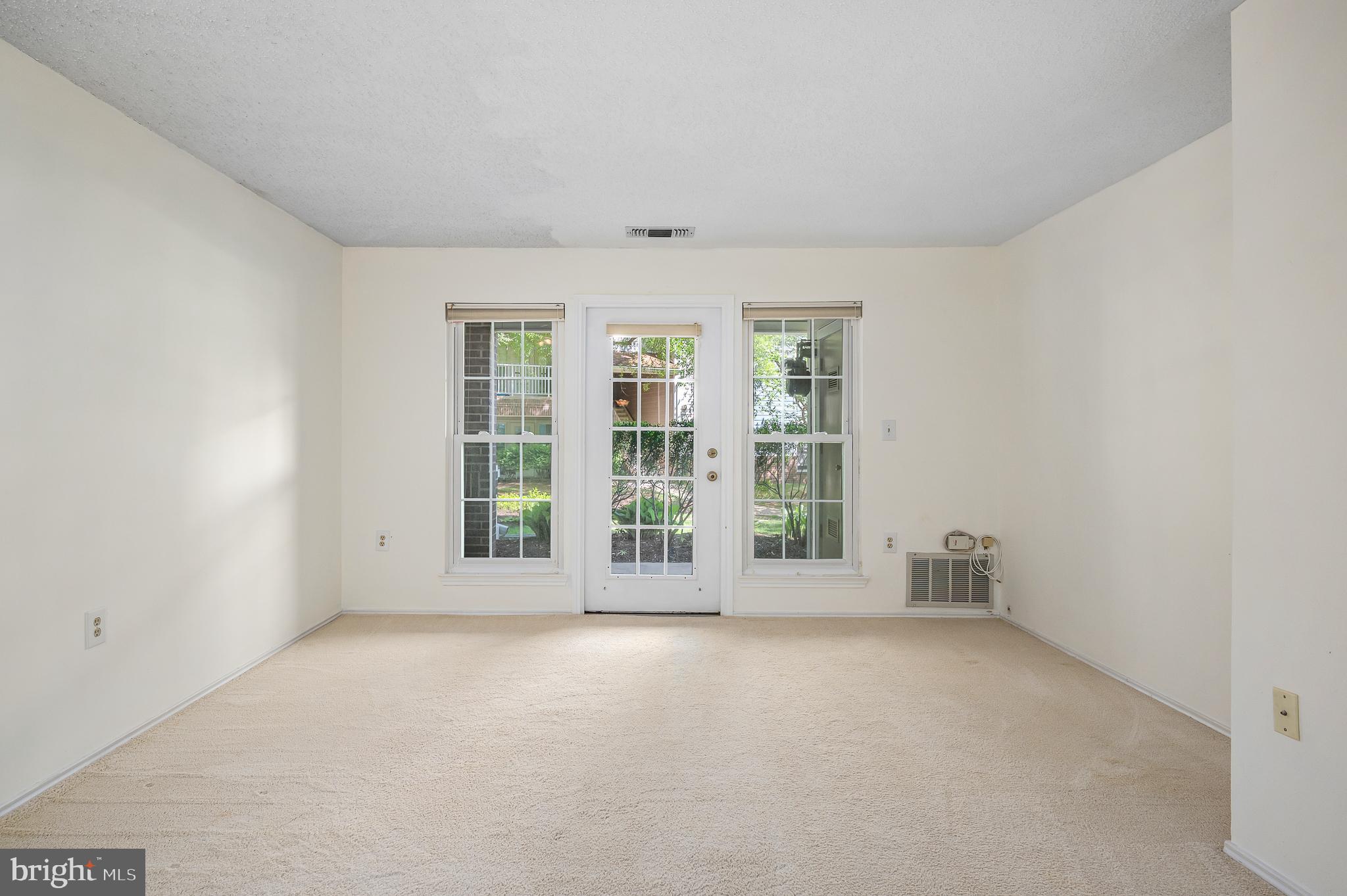 21029 Timber Ridge Terrace, Unit 104 Ashburn, VA 20147 - Photo 34 of 34 open living/dining floorplan