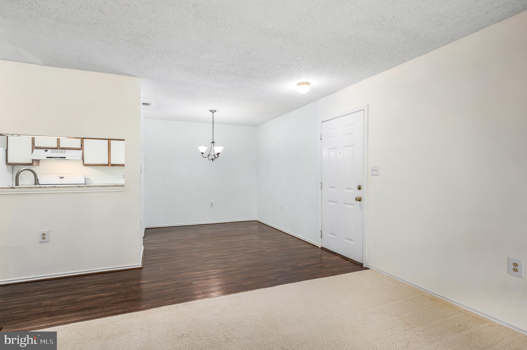 21029 Timber Ridge Terrace, Unit 104 Ashburn, VA 20147 - Photo 5 of 34 Living/Dining