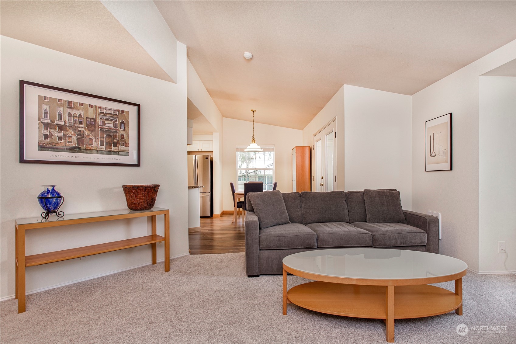 8653 Avondale Road Northeast, Unit D207 Redmond, WA 98052 - Photo 11 of 21 a living room with furniture and a couch