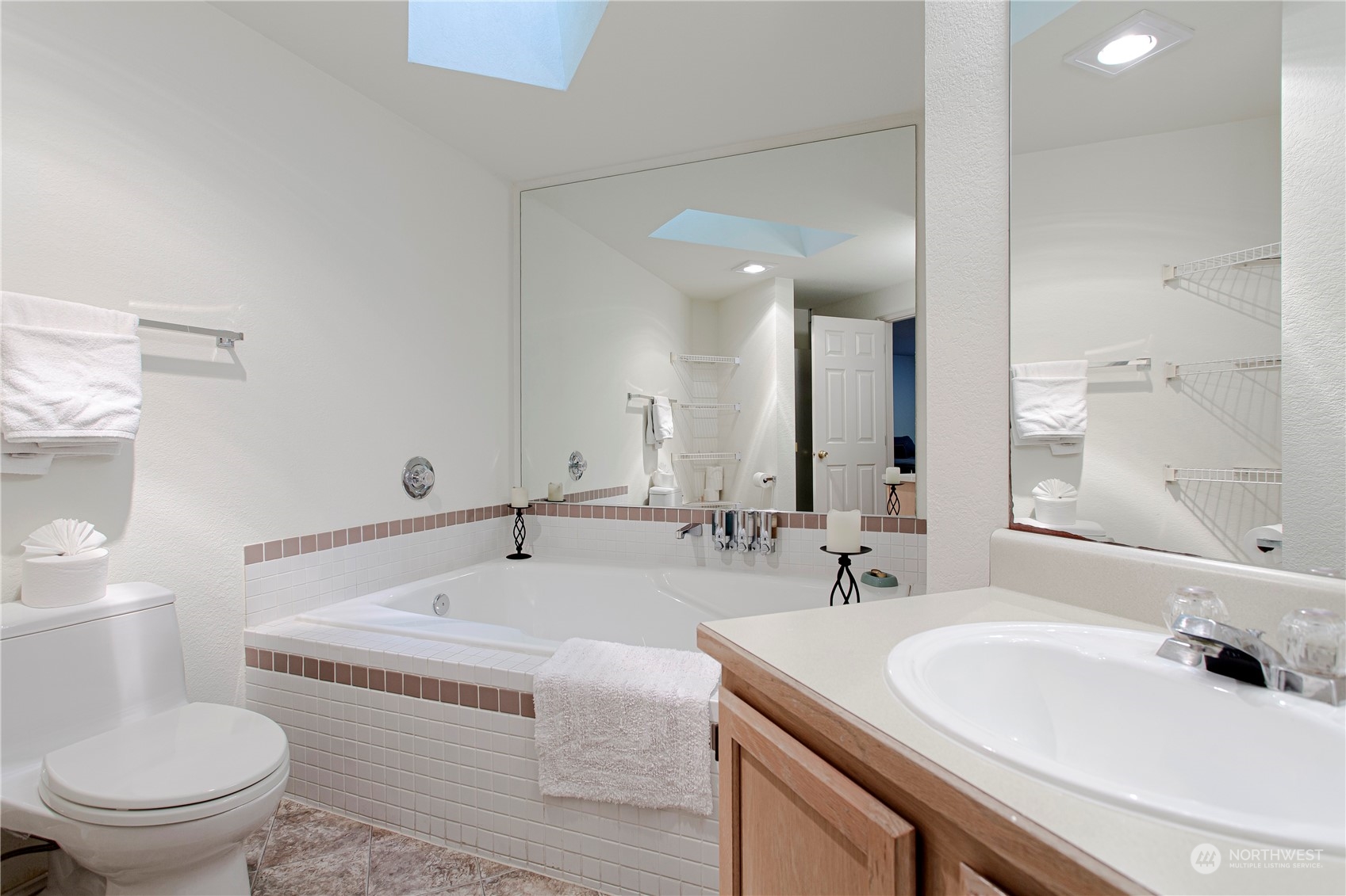 8653 Avondale Road Northeast, Unit D207 Redmond, WA 98052 - Photo 14 of 21 a bathroom with a sink and a toilet
