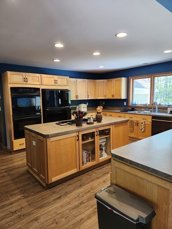 153 County Road Rochester, MA 02576 - Photo 15 of 39 a kitchen with stainless steel appliances granite countertop a stove a sink and a microwave