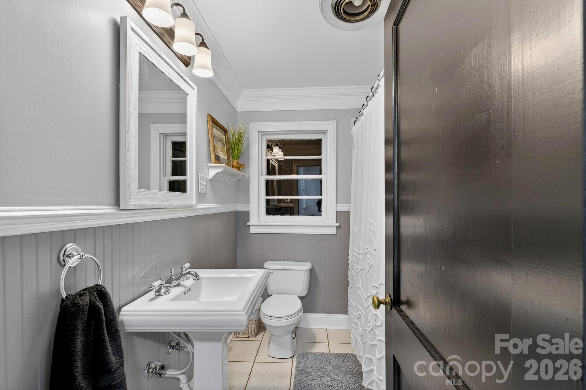 343 Hoyles Creek Road Dallas, NC 28034 - Photo 11 of 31 a bathroom with a sink mirror and toilet