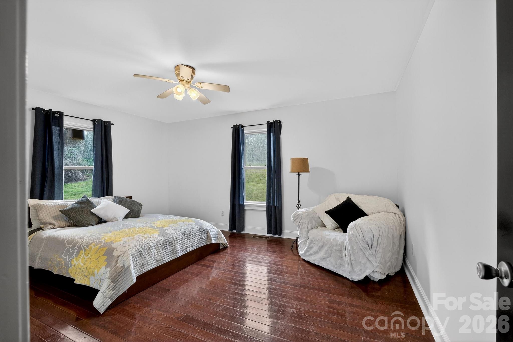 343 Hoyles Creek Road Dallas, NC 28034 - Photo 12 of 31 a bedroom with bed and a couch