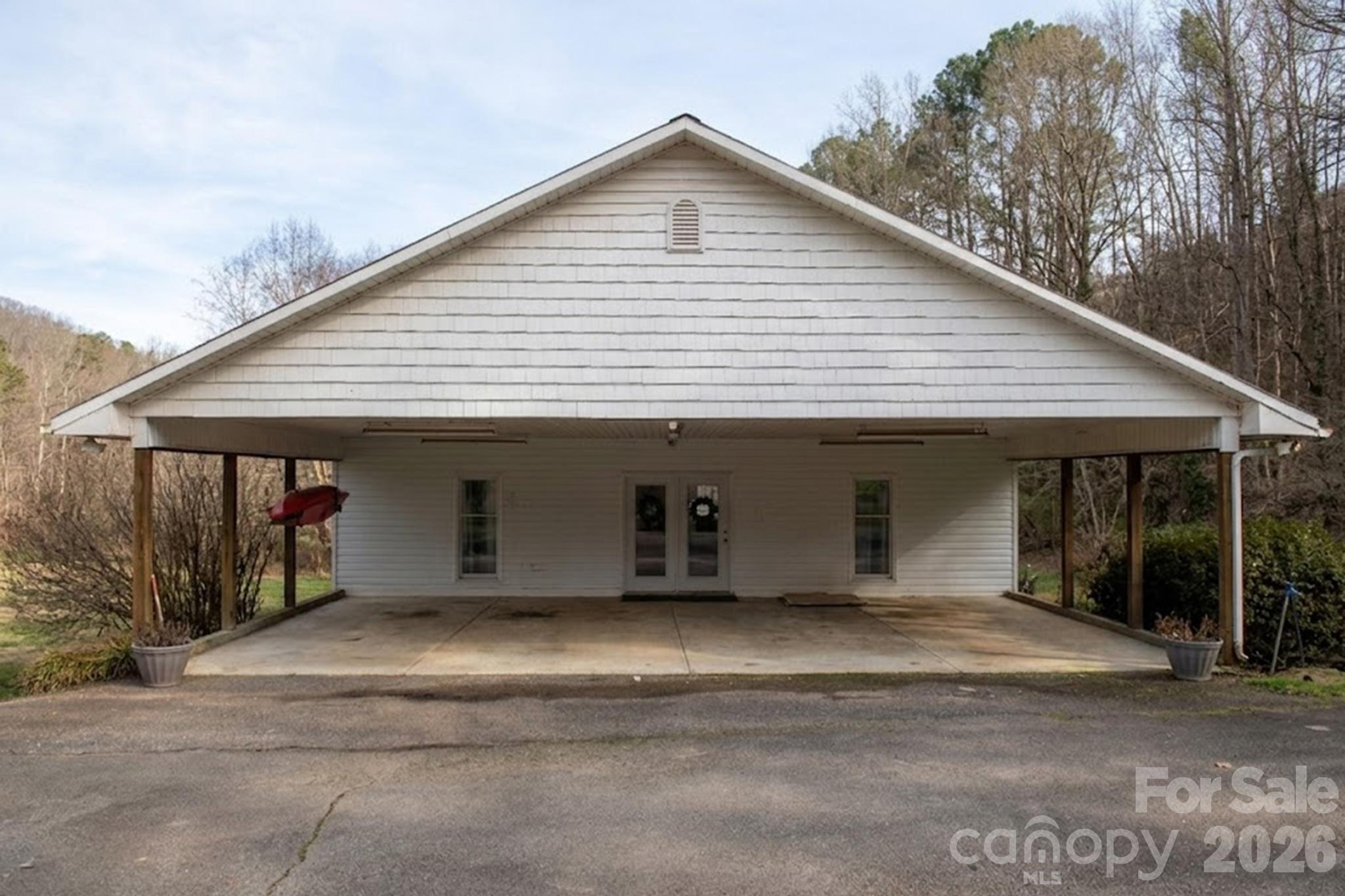 343 Hoyles Creek Road Dallas, NC 28034 - Photo 20 of 31 a front view of a house with garage