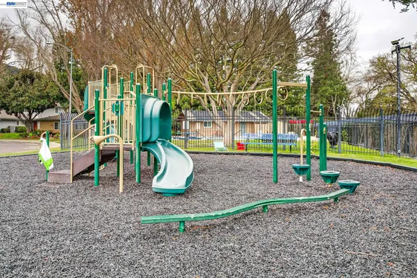 a view of a park with swings