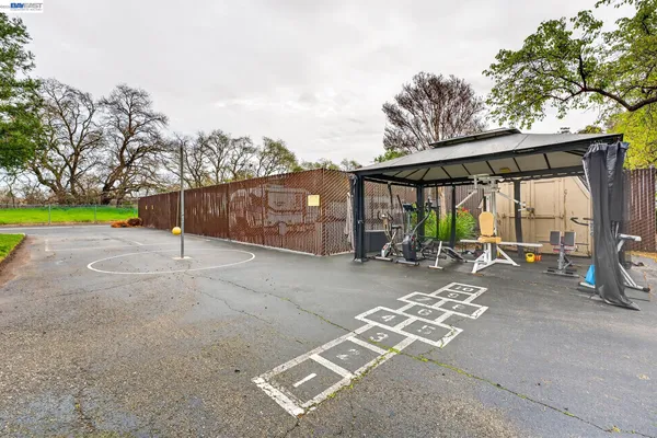 a view of a backyard with a patio