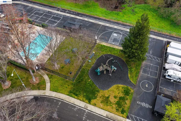 a view of a backyard with sitting area