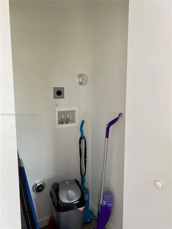 a bathroom with a toilet and a sink